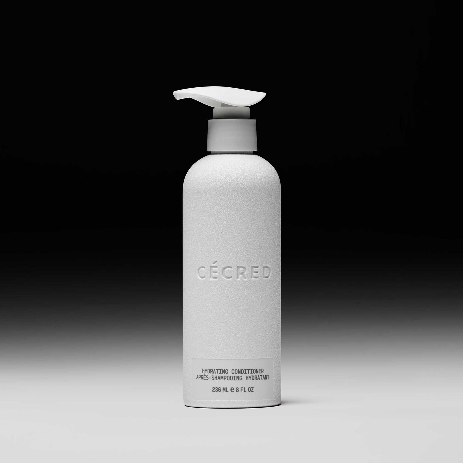 Cécred Hydrating Conditioner 8 fl oz pump bottle displayed upright against a gradient black-to-white background