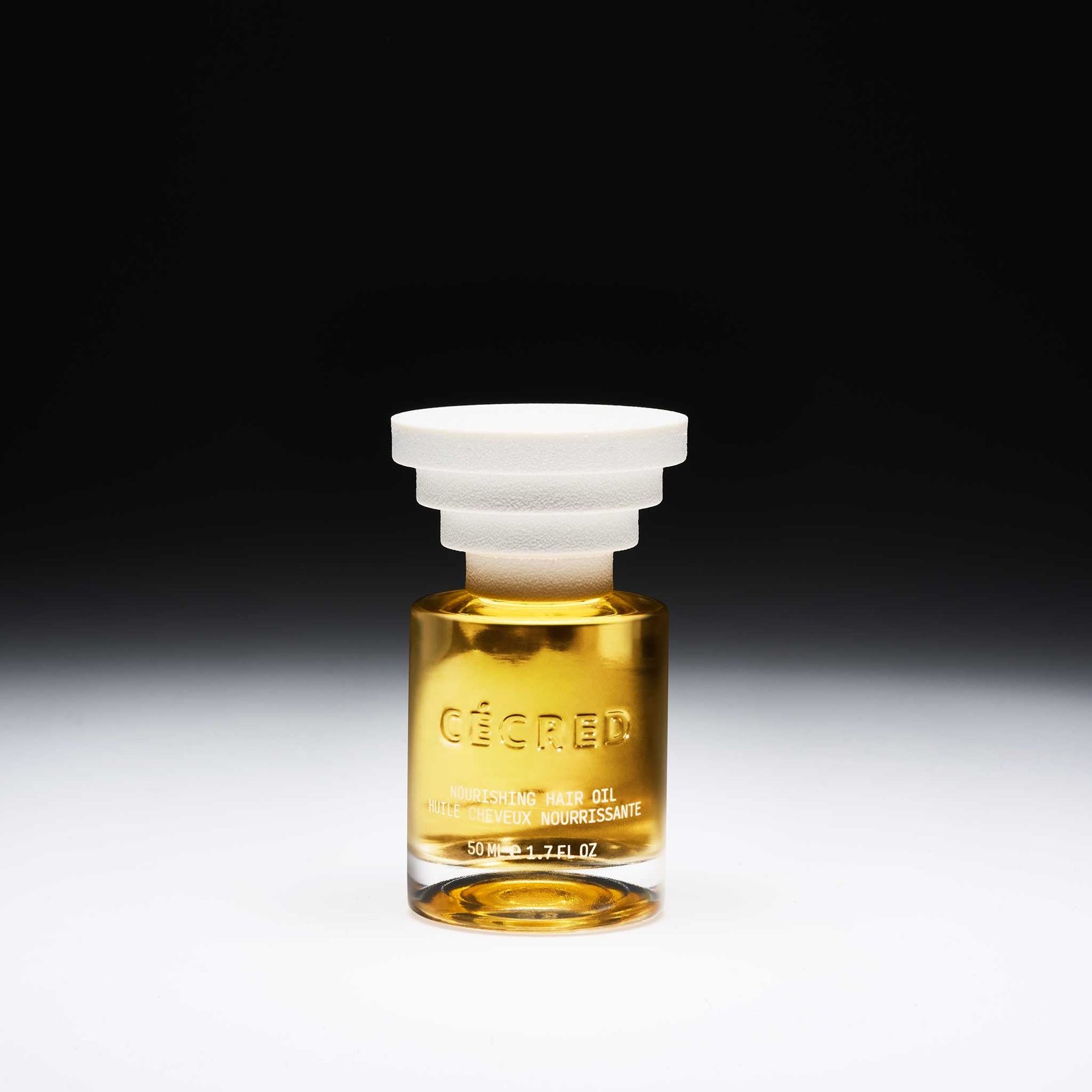 Cécred Nourishing Hair Oil bottle shown with rich, lightweight oil texture