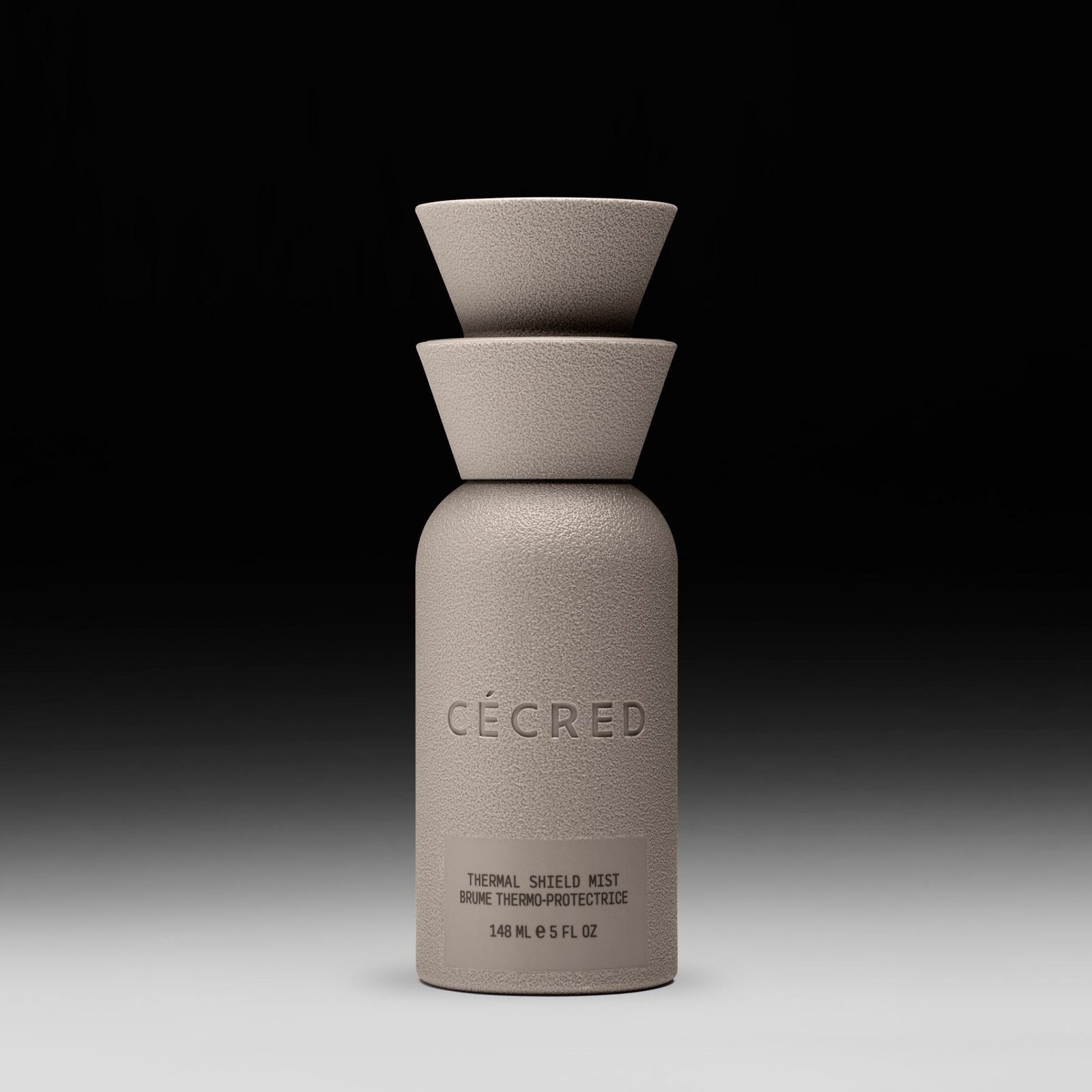 Cécred Thermal Shield Mist bottle displayed upright on a gradient black-to-white background