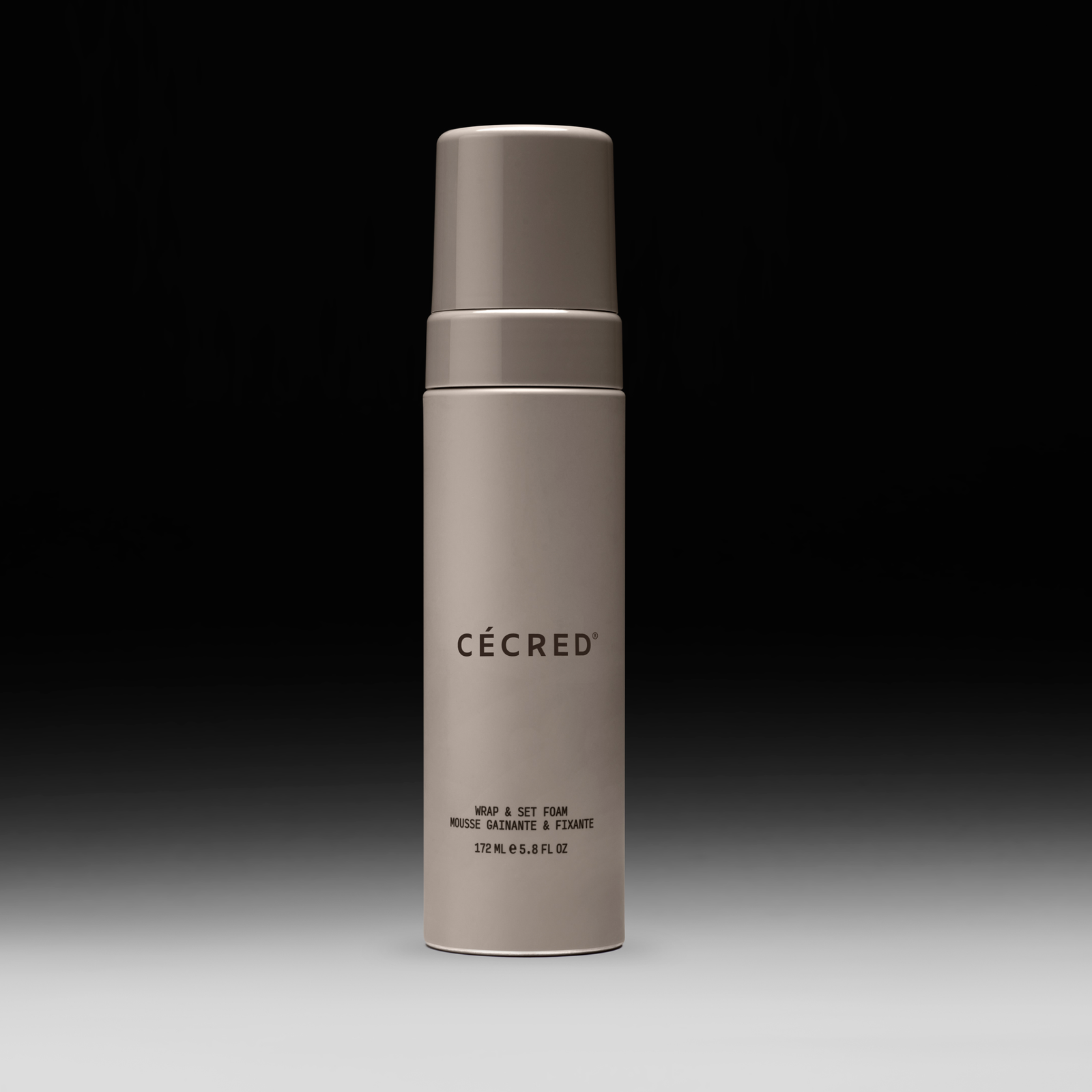 Cécred Wrap and Set Foam bottle displayed upright on a gradient black-to-white background